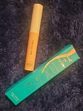 thrive causemetics highlighter stick And Eye Primer